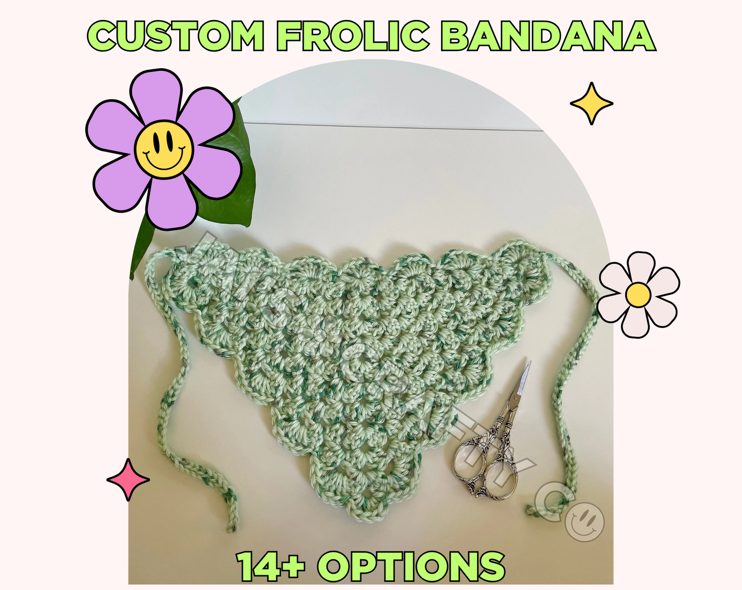 Green text frames the photo reading "Custom Frolic Bandana, 14+ color options." Centered is a handmade crochet bandana on a plain white background. The bandana features a scalloped edge border and a light green yarn with darker green hues throughout creating a speckled effect. On the left is a houseplant, and to the right is a pair of vintage silver scissors. There are also retro Y2K inspired sparkles and smiley face flowers framing the photo giving a cutesy vibe.